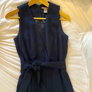 Navy jumpsuit; cropped wide leg pant